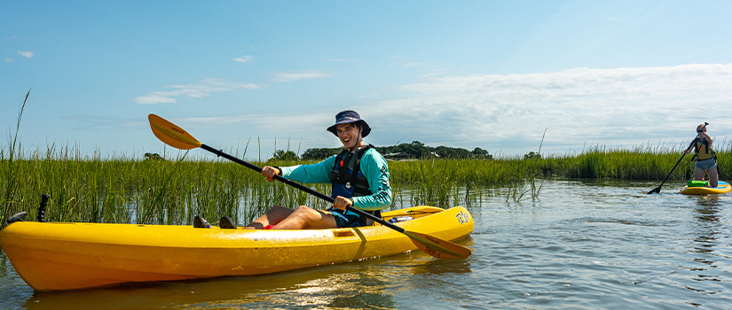 Student in a kayak on an adventure trip