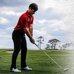 Ben Dietrich Ben Dietrich takes a swing on a golf course at UofSC