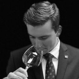 Beaty Fisher Beaty Fisher samples a wine by testing its nose